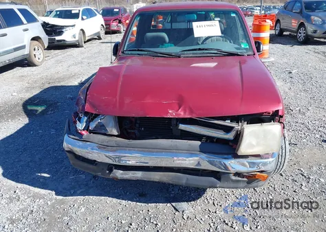 1999 Toyota Tacoma из США, поврежденный, VIN 4TAVL52N2XZ469451